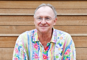 Headshot of Neil Stahl, Ph.D. wearing a patterned shirt