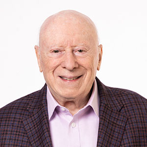 Headshot of Joseph L. Goldstein, MD wearing a white shirt