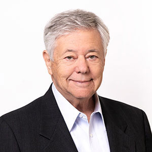 Headshot of Michael S. Brown, M.D. wearing a white shirt
