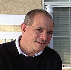 Headshot of Thomas DiCioccio, Ph.D. wearing a black shirt