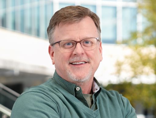 Headshot of Andrew Deubler.