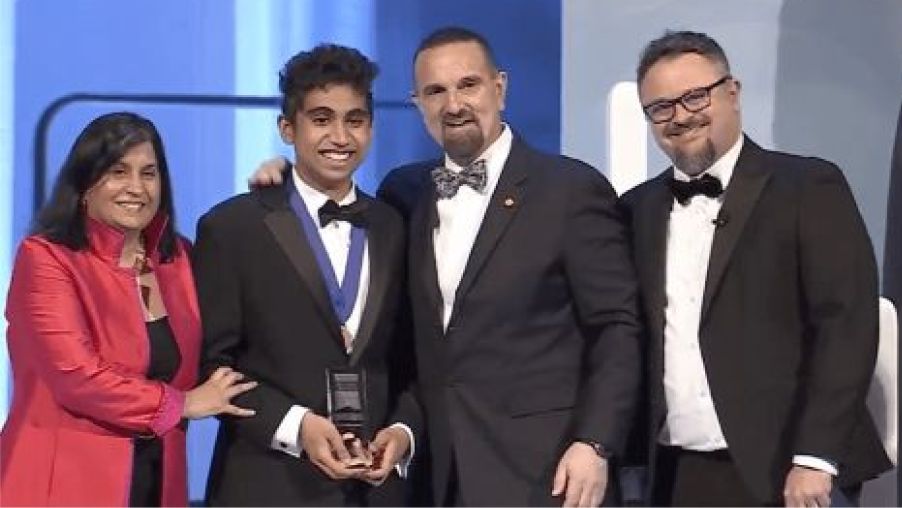 Video featuring various STEM programming produced or sponsored by Regeneron. Photo includes George D. Yancopoulos, MD, PhD, co-Founder, Board co-Chair, President and Chief Scientific Officer of Regeneron presenting the top award at the 2023 Regeneron Science Talent Search.