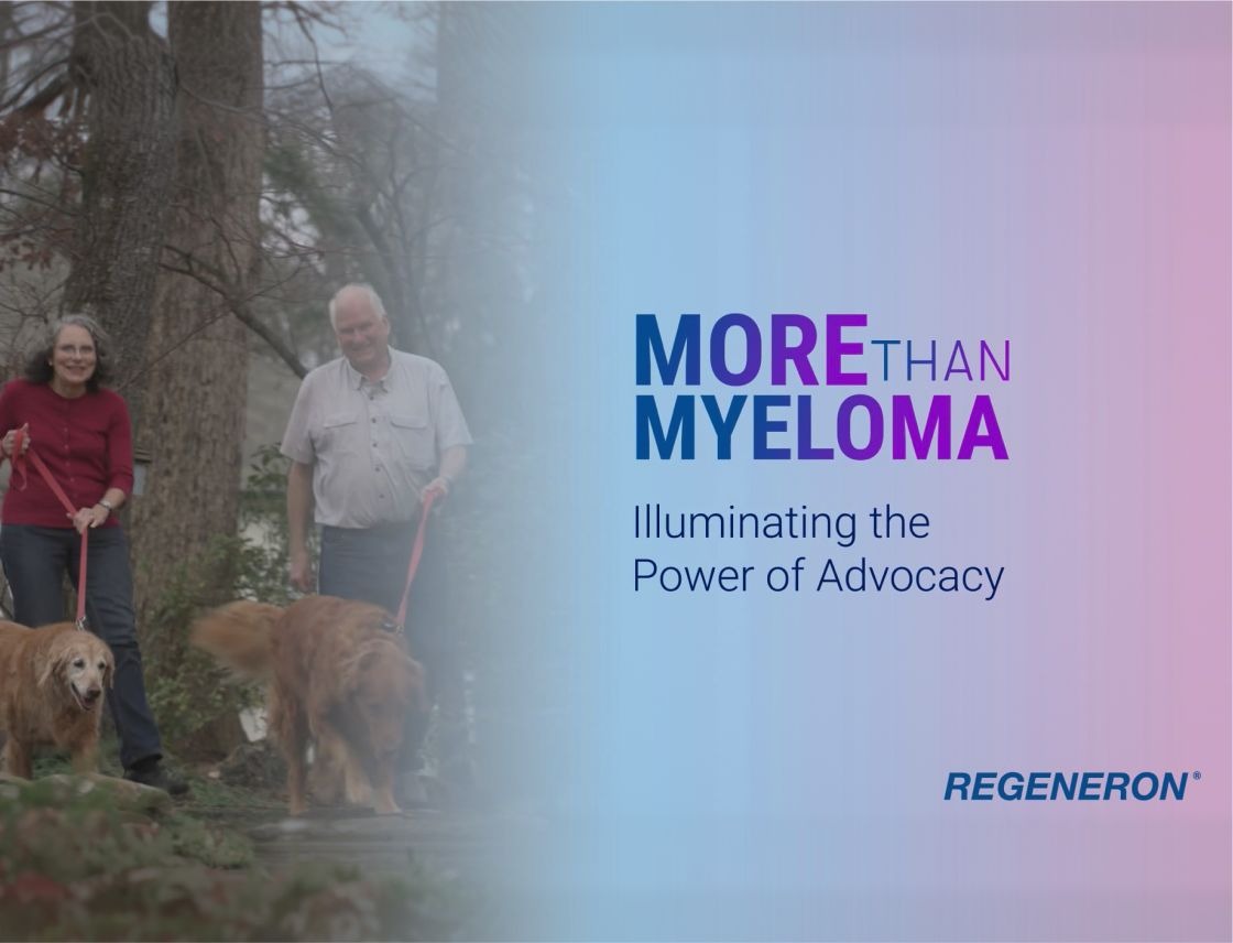 The Campbell family standing together and smiling.