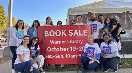 Julie Scherrer and Regeneron team at the Friends of Warner Library book sale