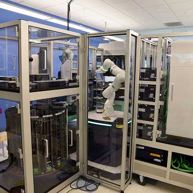  Regeneron Genetics Center® robotic employee preparing lab samples
