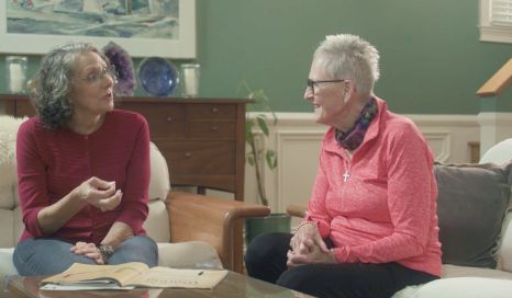   Linda, a woman living with multiple myeloma, talking to others living with the cancer in her support group