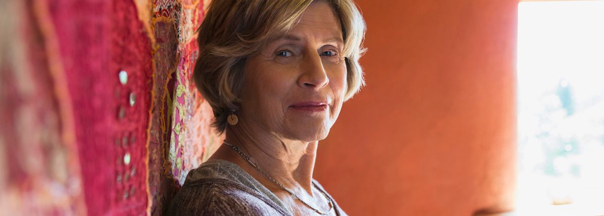 A Woman holding a mug