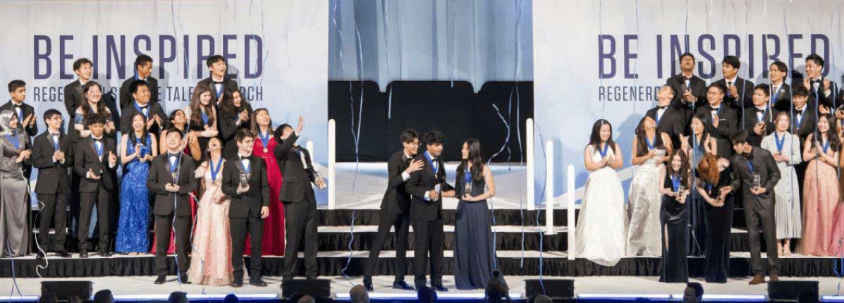 People standing on the Be Inspired stage