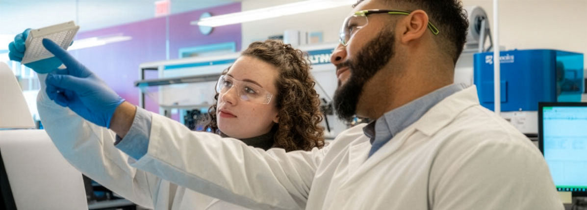 2 scientists studying results