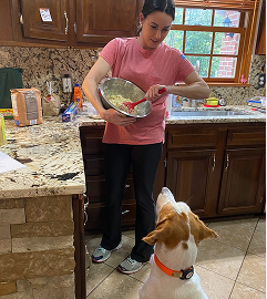 Erin Bragg baking dog treats for the Lousia County Animal Shelter on behalf of Regeneron