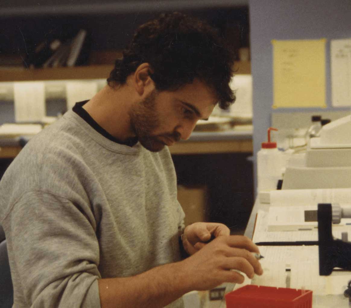 Candid photo of a man conducting research in a lab