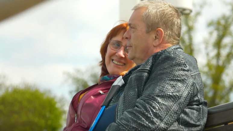 Wife looking at husband and smiling