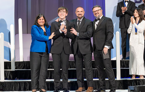  Regeneron Science Talent Search team presenting the 2026 top award to Connor Hill