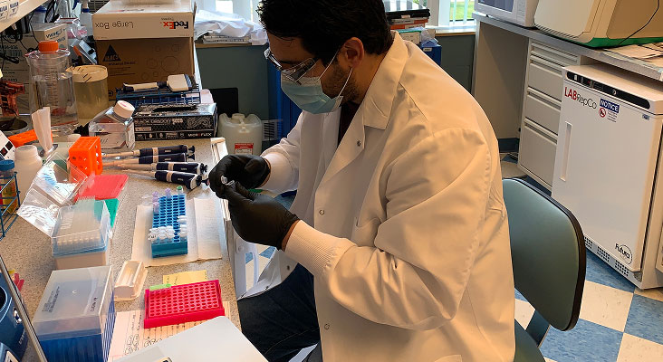 A scientist working at a desk
