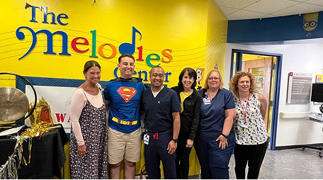 Briane Bourne with Regeneron team volunteering for children undergoing cancer treatment at Alabany Medical Center