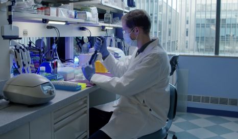  Scientist working at the Regeneron Genetics Center on gene CHRNB3