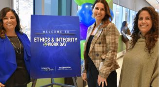3 women standing at Ethics & integrity @ Work Day event