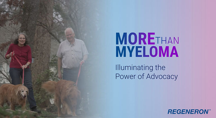 The Campbell family standing together and smiling.