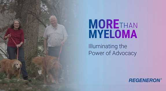 The Campbell family standing together and smiling.