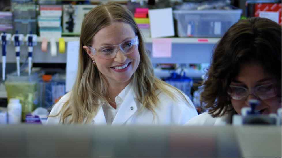  2 scientists working together